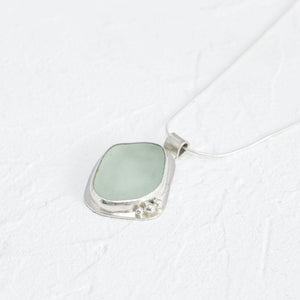 "Rosie" sea glass pendant with heart-shaped cut-out setting
