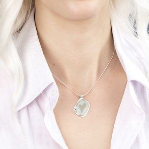 "Rosie" sea glass pendant with heart-shaped cut-out setting