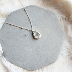 "Rosie" sea glass pendant with heart-shaped cut-out setting